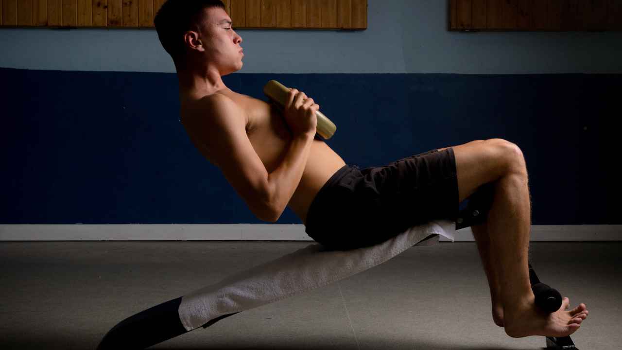 Advanced Variations and Progressions: Weighted Decline Situps